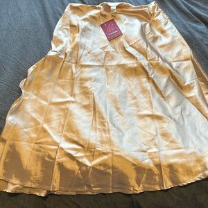 Women’s L, midi gold slit skirt. Brand new w/ tag.